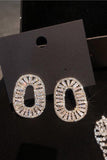 Boucles d’oreilles ovales simples en strass