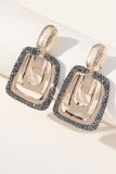 Boucles d’oreilles carrées en strass dorées pendantes