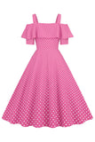 Robe à pois d’épaule froide rose des années 50