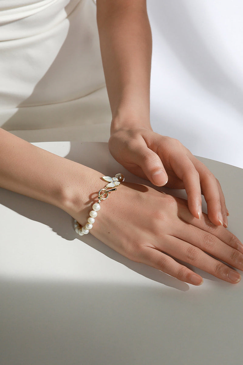 Charger l&#39;image dans la galerie, Bracelet extensible en perles blanches scintillantes avec papillon