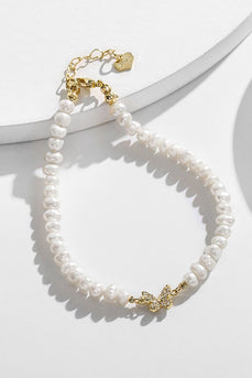 Bracelet de perles d’eau douce de culture blanche avec papillon en strass