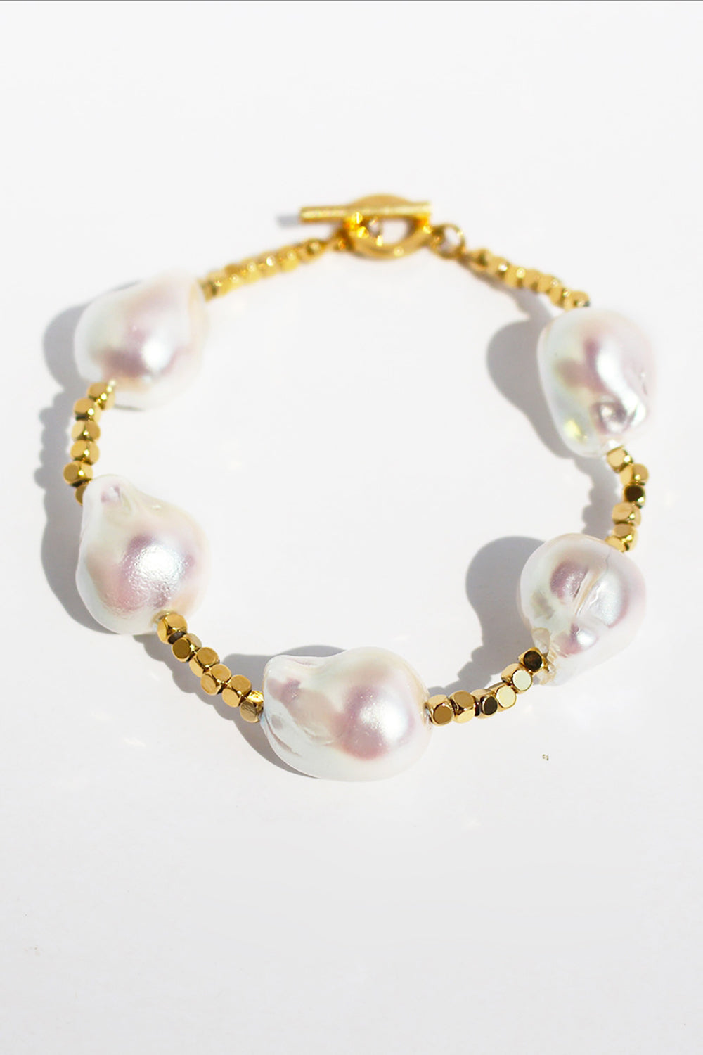 Bracelet en or perle en forme