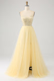 Robe de soirée jaune clair perlé en tulle avec fente