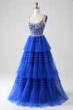 Robe de soirée bleu royal à plusieurs niveaux avec paillettes