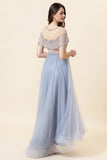 Robe de bal longue en tulle perle gris scintillante