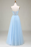 Robe de bal en tulle bleu clair scintillant avec appliques