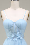 Robe de bal en tulle bleu clair scintillant avec appliques