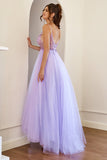 Robe de bal en tulle perlé violet