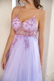 Robe de bal en tulle perlé violet