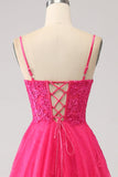 Robe de soirée longue en dentelle corset trapèze fuchsia avec fente