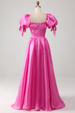 Robe de bal rose vif à manches bouffantes avec volants