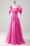 Robe de bal rose vif à manches bouffantes avec volants