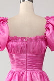Robe de bal rose vif à manches bouffantes avec volants