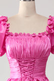 Robe de bal rose vif à manches bouffantes avec volants