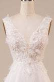 Robe de mariée longue ivoire perlée en tulle scintillante