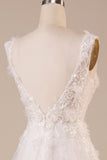 Robe de mariée longue ivoire perlée en tulle scintillante
