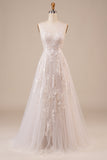 Robe de mariée longue en tulle dos nu ivoire avec Broderie