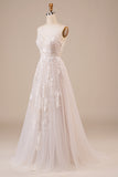 Robe de mariée longue en tulle dos nu ivoire avec Broderie