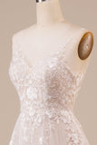 Robe de mariée longue en tulle dos nu ivoire avec Broderie
