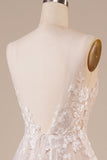 Robe de mariée longue en tulle dos nu ivoire avec Broderie