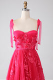Robe de Soirée longue fuchsia à bretelles spaghetti et fente