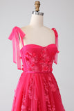 Robe de Soirée longue fuchsia à bretelles spaghetti et fente