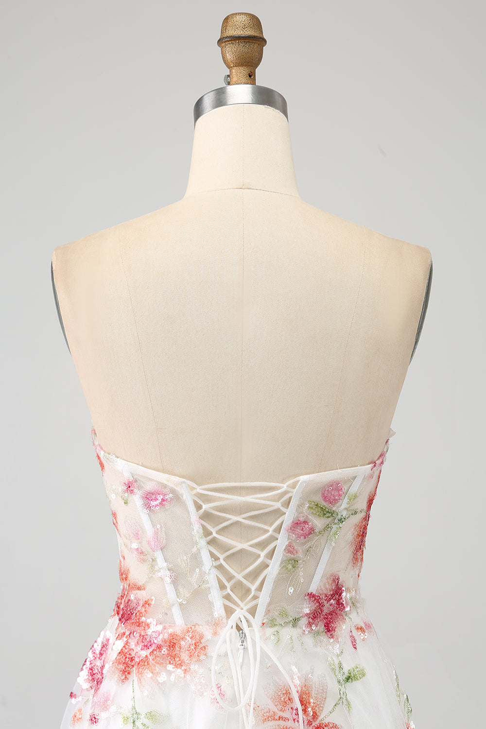 Robe de soirée longue Corset brodée de fleurs ivoire avec fente