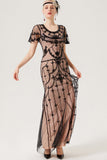 Robe longue à paillettes noir fard à joues des années 20