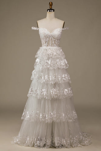 Robe de mariée en dentelle blanche scintillante avec fente