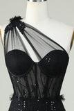 Robe de cocktail corset noire moulante à une épaule avec appliques