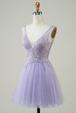 Une ligne de robe verte mignonne avec des appliques
