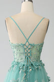 Robe de Soirée longue corset verte à bretelles spaghetti et appliques