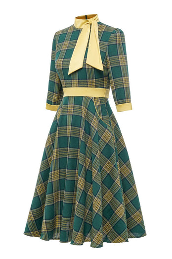 Robe à carreaux vert vintage des années 1950 avec nœud papillon