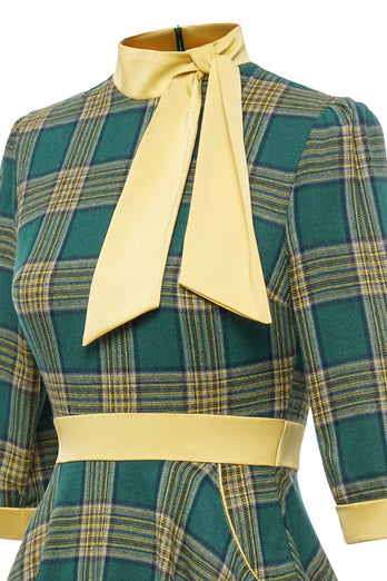 Robe à carreaux vert vintage des années 1950 avec nœud papillon