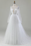 Robe de mariée en tulle plissée ivoire à col en V et manches longues